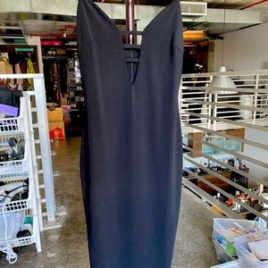 Black size medium (fits like a Small) fitted stappy dress